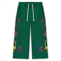 Vale Forever Green Tribal Graphic Distressed Wide Leg Sweatpants